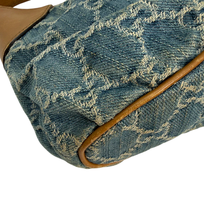 https://cdn.shopify.com/s/files/1/0564/9376/8855/files/Gucci_Pochette_Sherry_Line_Denim_monogram_blau_vintage_GG8727.webp?v=1783592665
