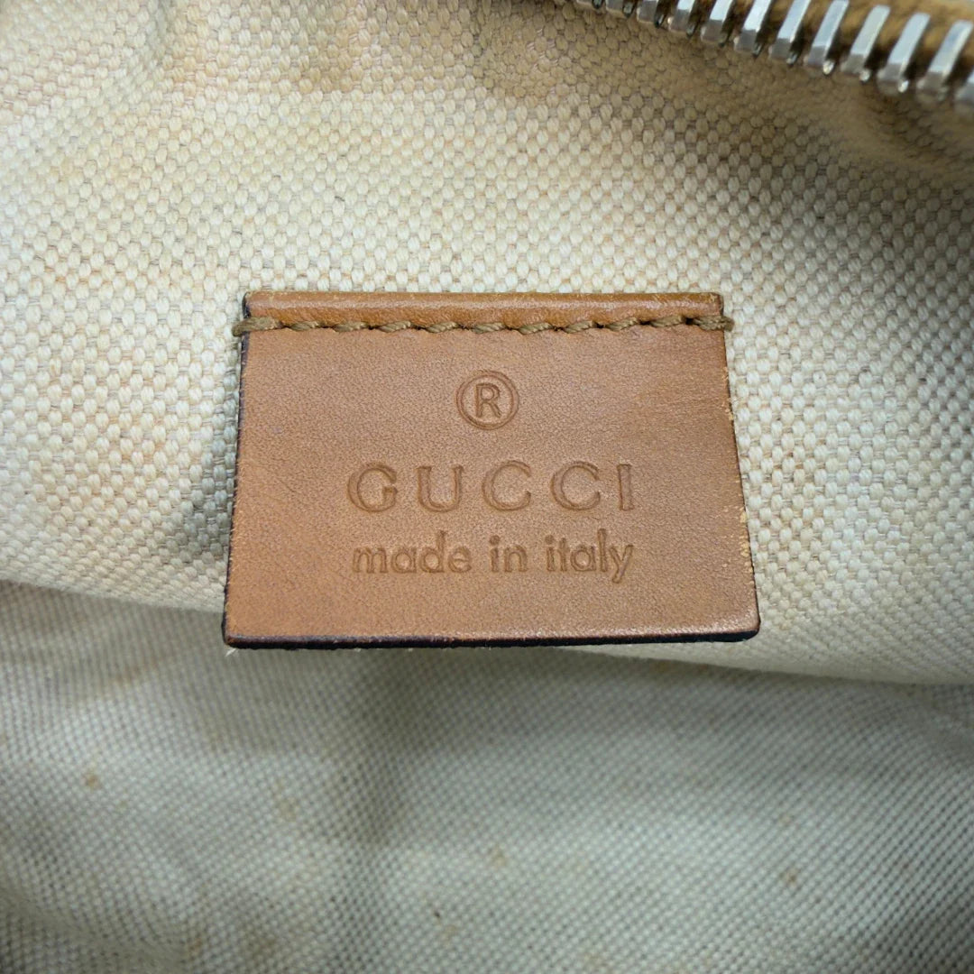 https://cdn.shopify.com/s/files/1/0564/9376/8855/files/Gucci_Pochette_Sherry_Line_Denim_monogram_blau_vintage_GG8735.webp?v=1783592665