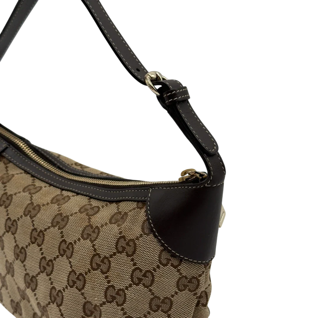 https://cdn.shopify.com/s/files/1/0564/9376/8855/files/Gucci_Pochette_Sherry_Line_monogram_beige_11.webp?v=1784281813