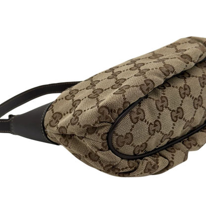 https://cdn.shopify.com/s/files/1/0564/9376/8855/files/Gucci_Pochette_Sherry_Line_monogram_beige_12.webp?v=1784281813