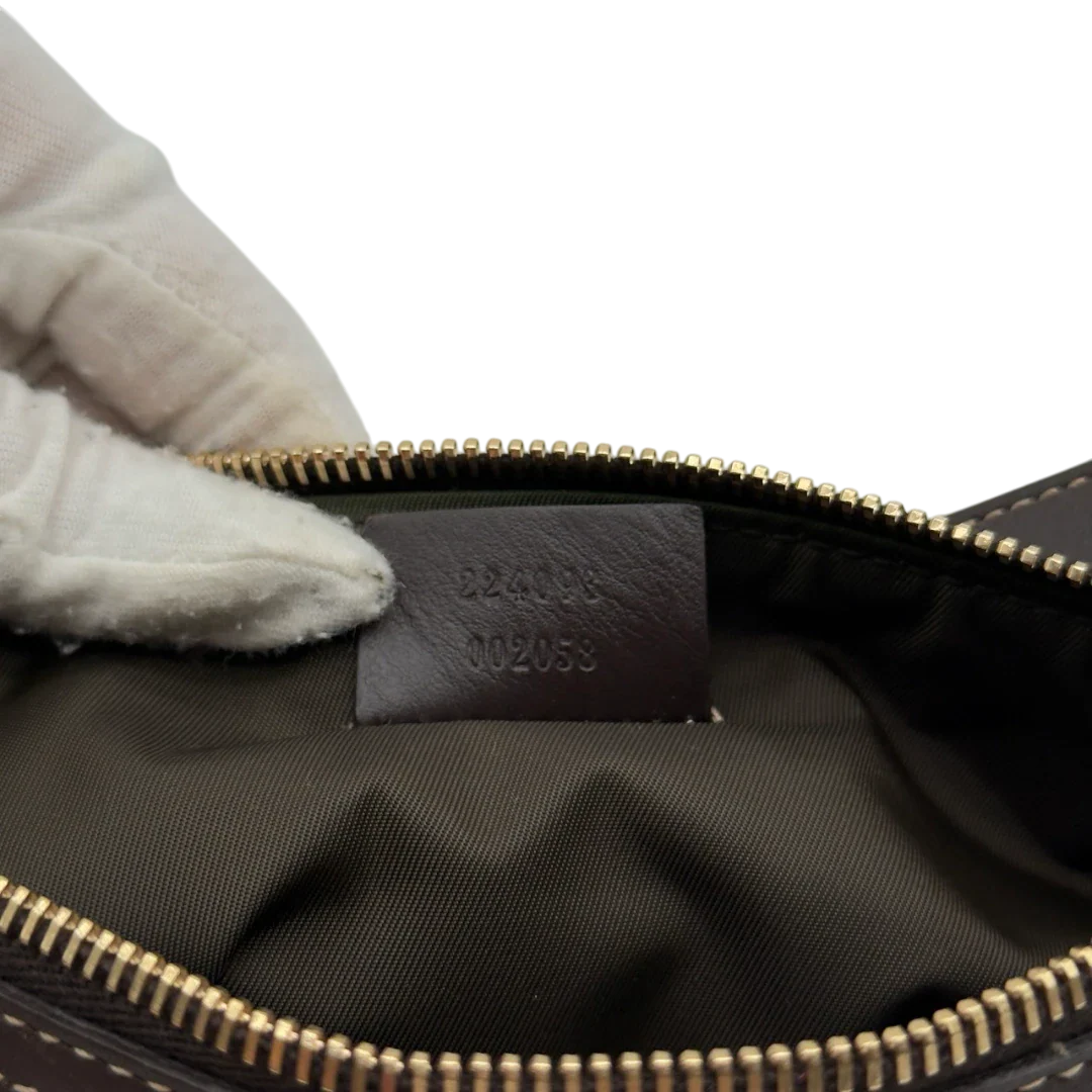 https://cdn.shopify.com/s/files/1/0564/9376/8855/files/Gucci_Pochette_Sherry_Line_monogram_beige_14.webp?v=1784281813
