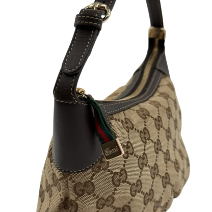 https://cdn.shopify.com/s/files/1/0564/9376/8855/files/Gucci_Pochette_Sherry_Line_monogram_beige_9.webp?v=1784281813