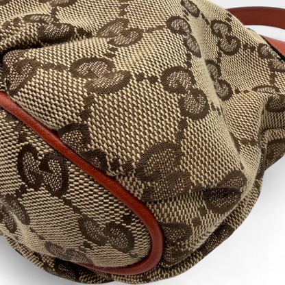 https://cdn.shopify.com/s/files/1/0564/9376/8855/files/Gucci_Pochette_Sherry_Line_monogram_beige_vintage76912.webp?v=1759394231