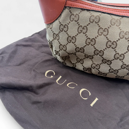 https://cdn.shopify.com/s/files/1/0564/9376/8855/files/Gucci_Pochette_Sherry_Line_monogram_beige_vintage77022.webp?v=1759394231