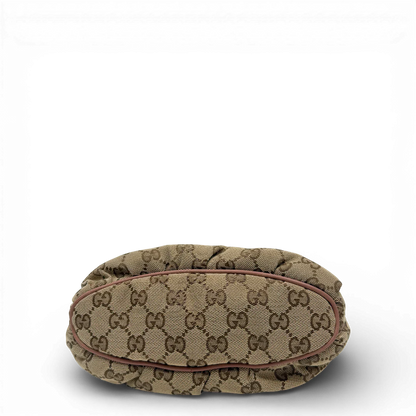 https://cdn.shopify.com/s/files/1/0564/9376/8855/files/Gucci_Pochette_Sherry_Line_monogram_beige_vintage_GG_0075.webp?v=1771500976