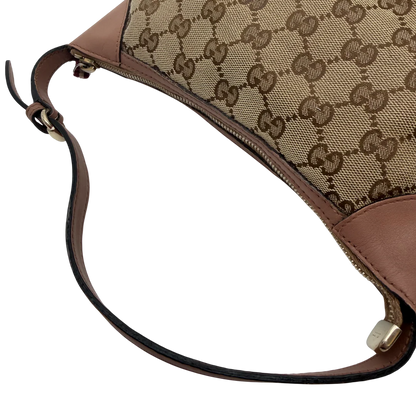 https://cdn.shopify.com/s/files/1/0564/9376/8855/files/Gucci_Pochette_Sherry_Line_monogram_beige_vintage_GG_0080.webp?v=1771500976
