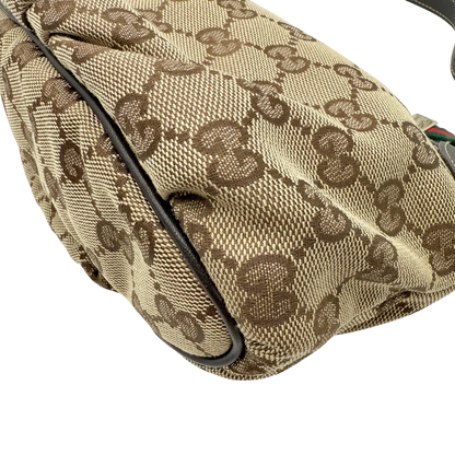 https://cdn.shopify.com/s/files/1/0564/9376/8855/files/Gucci_Pochette_Sherry_Line_monogram_beige_vintage_GG_1481.webp?v=1771406559
