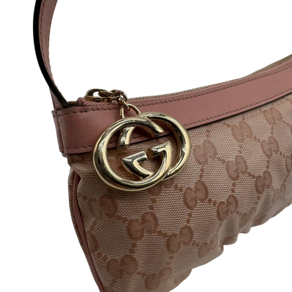 https://cdn.shopify.com/s/files/1/0564/9376/8855/files/Gucci_Pochette_mit_GG_Anhanger_PVC_monogram_rosa_vintage_GG1757.webp?v=1779407744