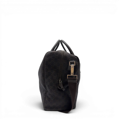 https://cdn.shopify.com/s/files/1/0564/9376/8855/files/Gucci_Reisetasche_50_mit_Umhangegurt_monogram_dunkelbraun_2.webp?v=1782904192