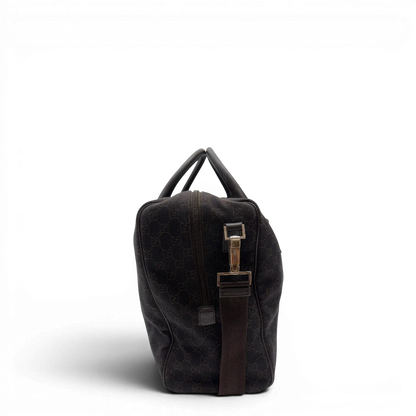 https://cdn.shopify.com/s/files/1/0564/9376/8855/files/Gucci_Reisetasche_50_mit_Umhangegurt_monogram_dunkelbraun_3.webp?v=1782904193