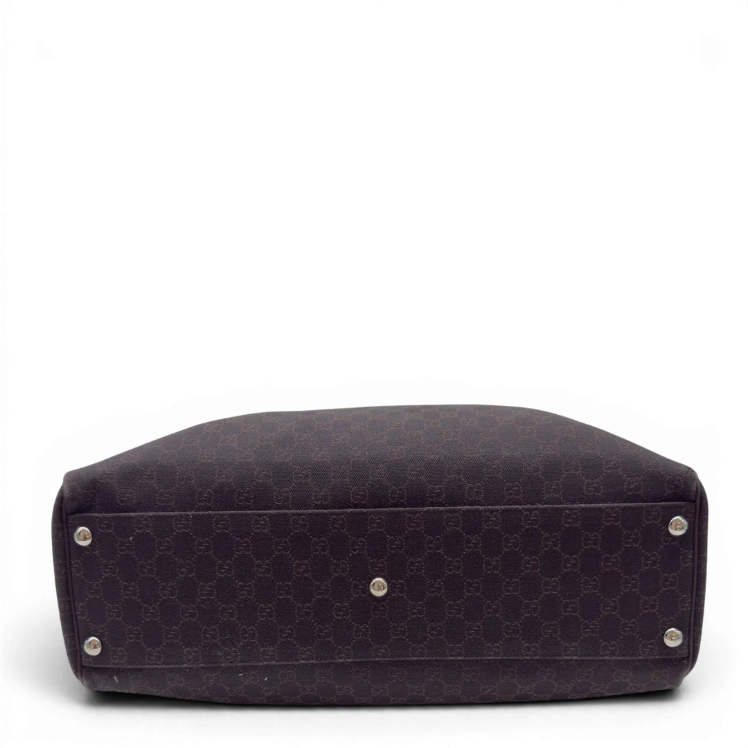 https://cdn.shopify.com/s/files/1/0564/9376/8855/files/Gucci_Reisetasche_50_mit_Umhangegurt_monogram_dunkelbraun_5.webp?v=1782904192
