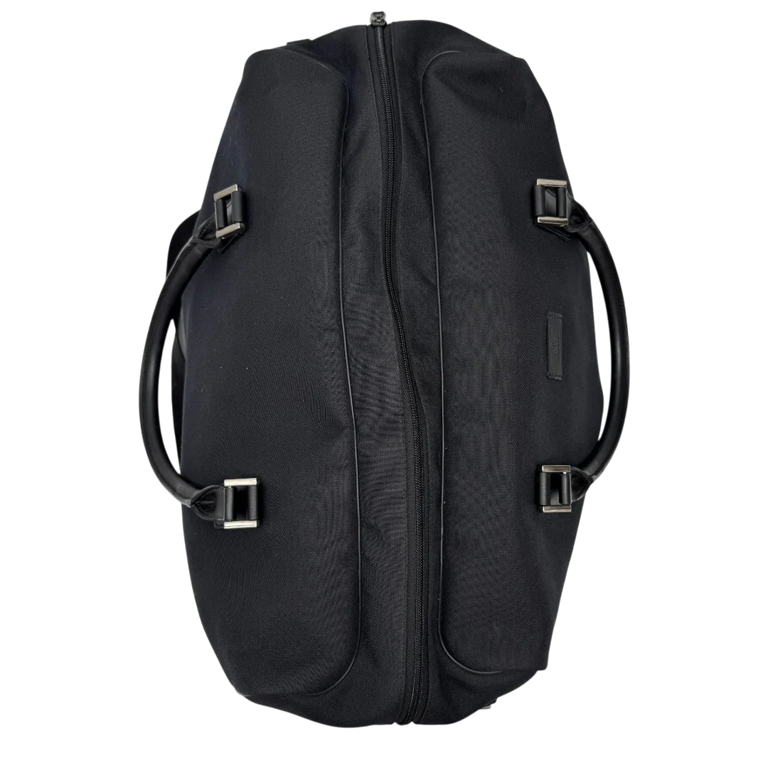 https://cdn.shopify.com/s/files/1/0564/9376/8855/files/Gucci_Reisetasche_50_mit_Umhangegurt_schwarz_20.webp?v=1784245416