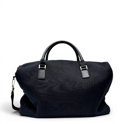 https://cdn.shopify.com/s/files/1/0564/9376/8855/files/Gucci_Reisetasche_50_mit_Umhangegurt_schwarz_4.webp?v=1784245417