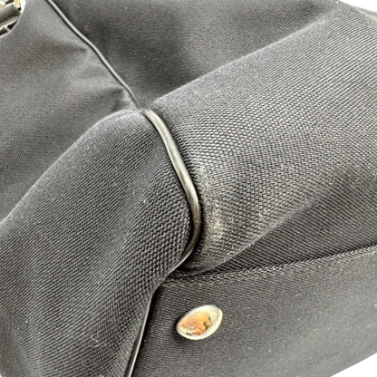 https://cdn.shopify.com/s/files/1/0564/9376/8855/files/Gucci_Reisetasche_50_mit_Umhangegurt_schwarz_8.webp?v=1784245417