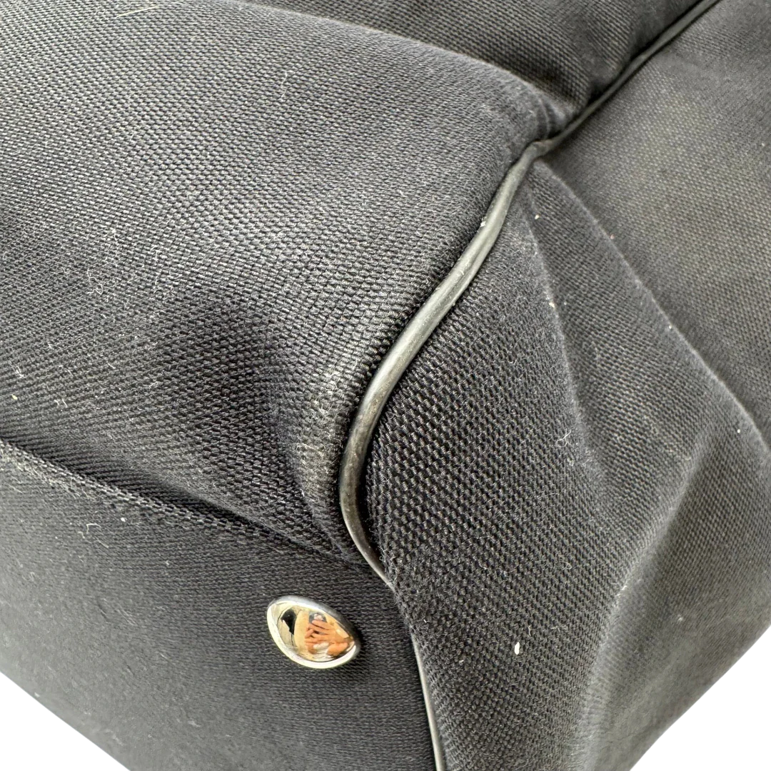 https://cdn.shopify.com/s/files/1/0564/9376/8855/files/Gucci_Reisetasche_50_mit_Umhangegurt_schwarz_9.webp?v=1784245417