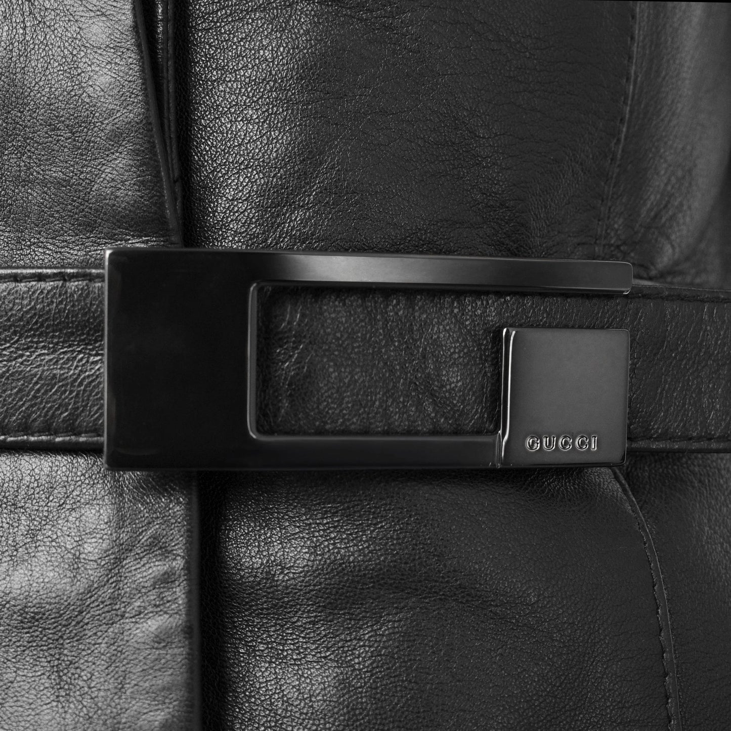 Gucci SS 1998 Tom Ford era tailored leather blazer jacket with a large embossed metal G buckle closure at the waist. Size IT 42 / UK 10.  Available at Artefact Archive.