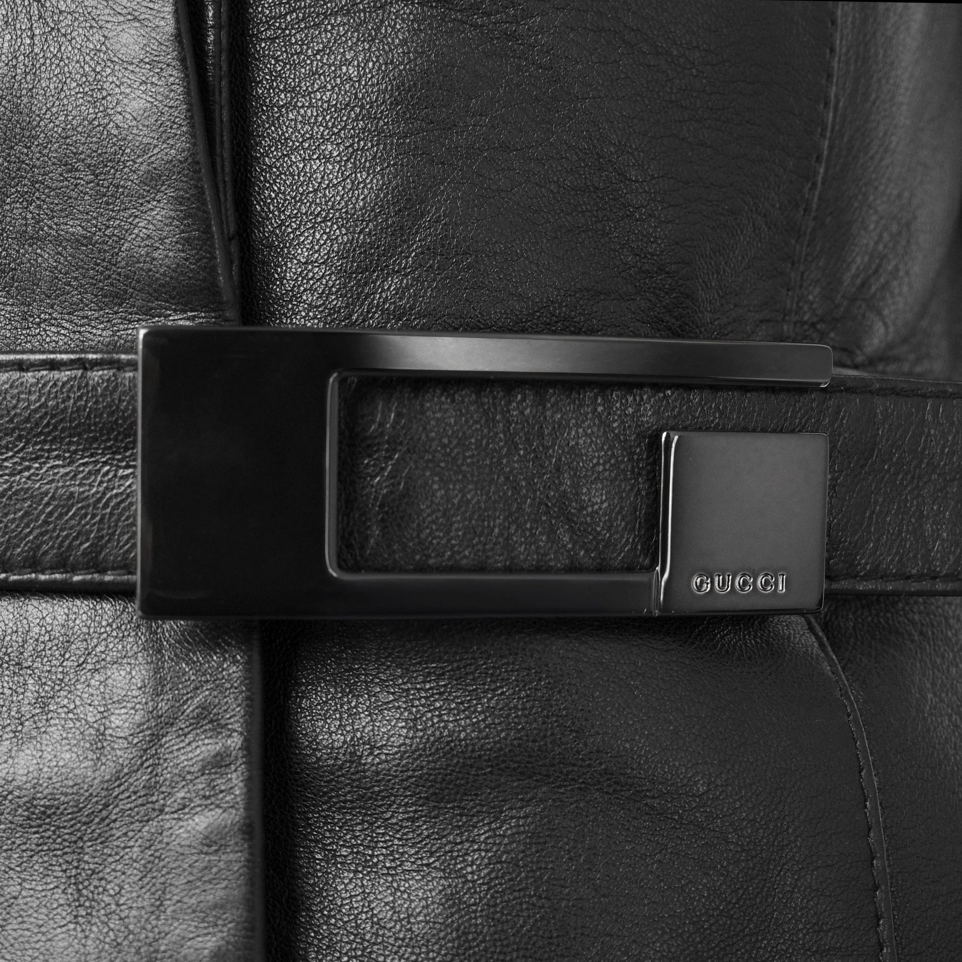 Gucci SS 1998 Tom Ford era tailored leather blazer jacket with a large embossed metal G buckle closure at the waist. Size IT 42 / UK 10.  Available at Artefact Archive.