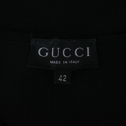 Gucci by Tom Ford SS 1998 viscose knit short sleeve top with a sleeve cutout featuring an engraved metal plate. Size IT 42 / UK 8-10.