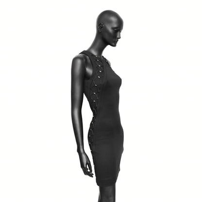 Gucci SS 2010 dress designed by Frida Giannini with bungee-inspired lace up detailing on the sides and upper chest. Size S. Available at Artefact Archive.