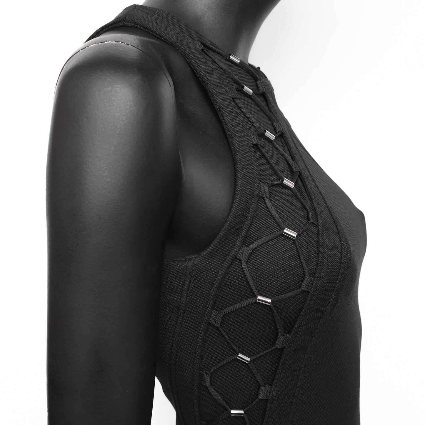 Gucci SS 2010 dress designed by Frida Giannini with bungee-inspired lace up detailing on the sides and upper chest. Size S. Available at Artefact Archive.