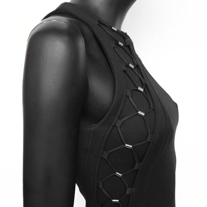 Gucci SS 2010 dress designed by Frida Giannini with bungee-inspired lace up detailing on the sides and upper chest. Size S. Available at Artefact Archive.