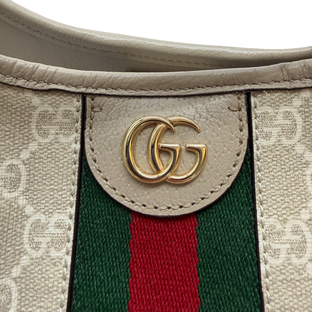 https://cdn.shopify.com/s/files/1/0564/9376/8855/files/Gucci_Schultertache_Ophidia_Bucket_monogram_beige_vintage_GG_0029.webp?v=1771411200