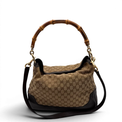 https://cdn.shopify.com/s/files/1/0564/9376/8855/files/Gucci_Schultertasche_Bamboo_mit_Umhangegurt_monogram_beige_1.webp?v=1781855073