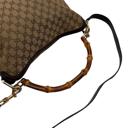 https://cdn.shopify.com/s/files/1/0564/9376/8855/files/Gucci_Schultertasche_Bamboo_mit_Umhangegurt_monogram_beige_11.webp?v=1781855073