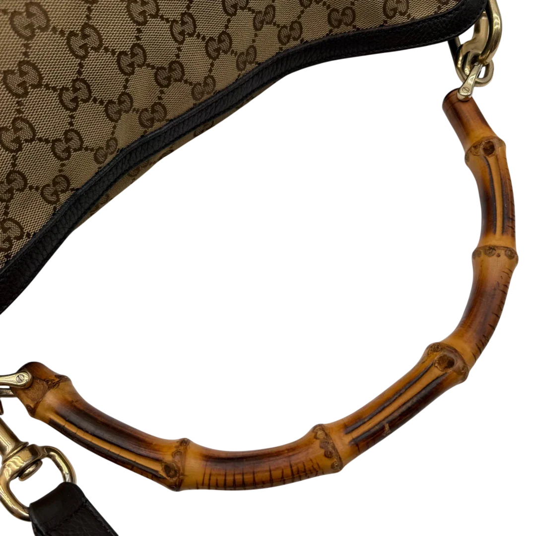 https://cdn.shopify.com/s/files/1/0564/9376/8855/files/Gucci_Schultertasche_Bamboo_mit_Umhangegurt_monogram_beige_13.webp?v=1781855073