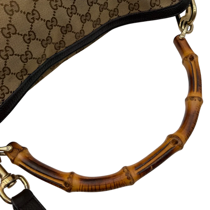 https://cdn.shopify.com/s/files/1/0564/9376/8855/files/Gucci_Schultertasche_Bamboo_mit_Umhangegurt_monogram_beige_13.webp?v=1781855073