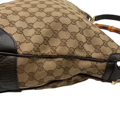 https://cdn.shopify.com/s/files/1/0564/9376/8855/files/Gucci_Schultertasche_Bamboo_mit_Umhangegurt_monogram_beige_14.webp?v=1781855073