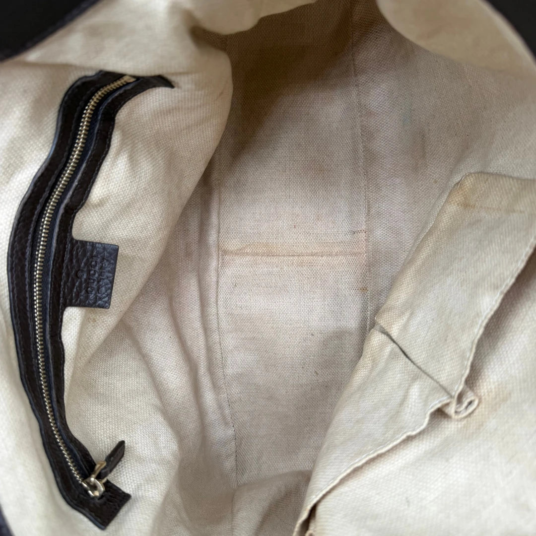https://cdn.shopify.com/s/files/1/0564/9376/8855/files/Gucci_Schultertasche_Bamboo_mit_Umhangegurt_monogram_beige_17.webp?v=1781855073