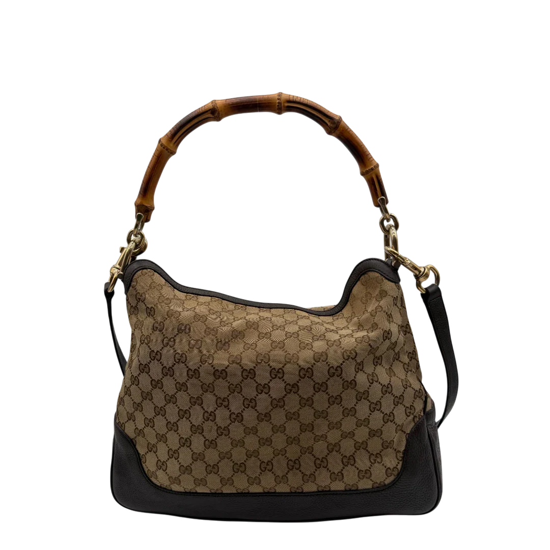 https://cdn.shopify.com/s/files/1/0564/9376/8855/files/Gucci_Schultertasche_Bamboo_mit_Umhangegurt_monogram_beige_2.webp?v=1781855073