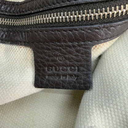 https://cdn.shopify.com/s/files/1/0564/9376/8855/files/Gucci_Schultertasche_Bamboo_mit_Umhangegurt_monogram_beige_vintage_GG8755.webp?v=1781083018