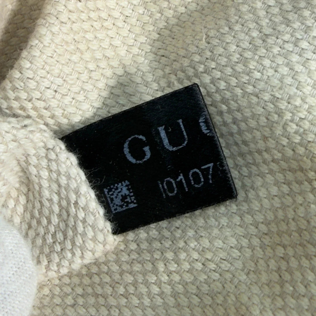 https://cdn.shopify.com/s/files/1/0564/9376/8855/files/Gucci_Schultertasche_Bamboo_mit_Umhangegurt_monogram_beige_vintage_GG8757.webp?v=1781083017