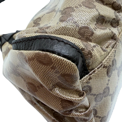 https://cdn.shopify.com/s/files/1/0564/9376/8855/files/Gucci_Schultertasche_D-Ring_PVC_monogram_beige_vintage_GG6246.webp?v=1778680147