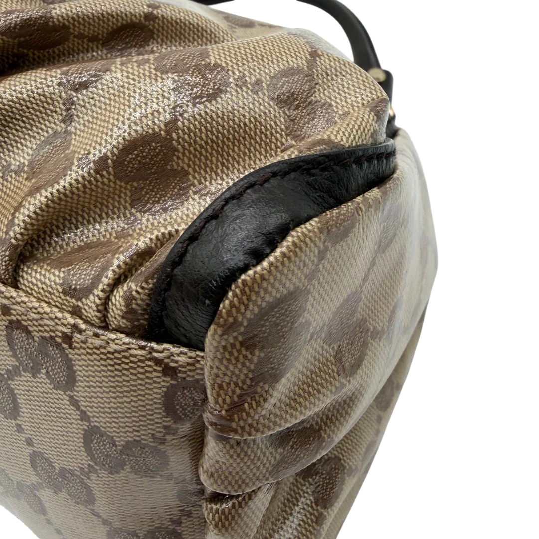 https://cdn.shopify.com/s/files/1/0564/9376/8855/files/Gucci_Schultertasche_D-Ring_PVC_monogram_beige_vintage_GG6248.webp?v=1778680147