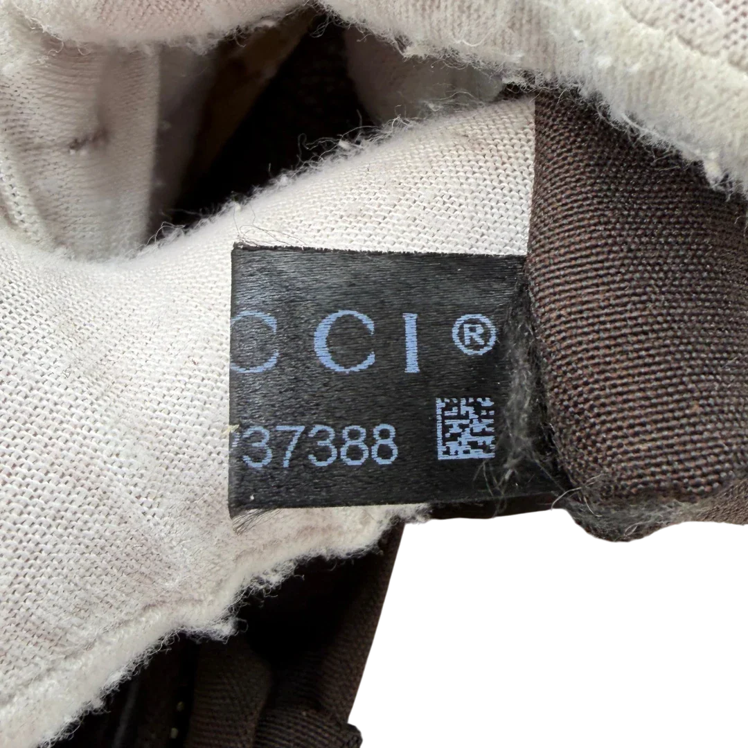 https://cdn.shopify.com/s/files/1/0564/9376/8855/files/Gucci_Schultertasche_D-Ring_PVC_monogram_beige_vintage_GG6259.webp?v=1778680148