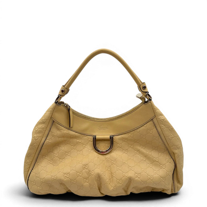 https://cdn.shopify.com/s/files/1/0564/9376/8855/files/Gucci_Schultertasche_D-Ring_large_aus_Leder_monogram_gelb_1.webp?v=1784281400