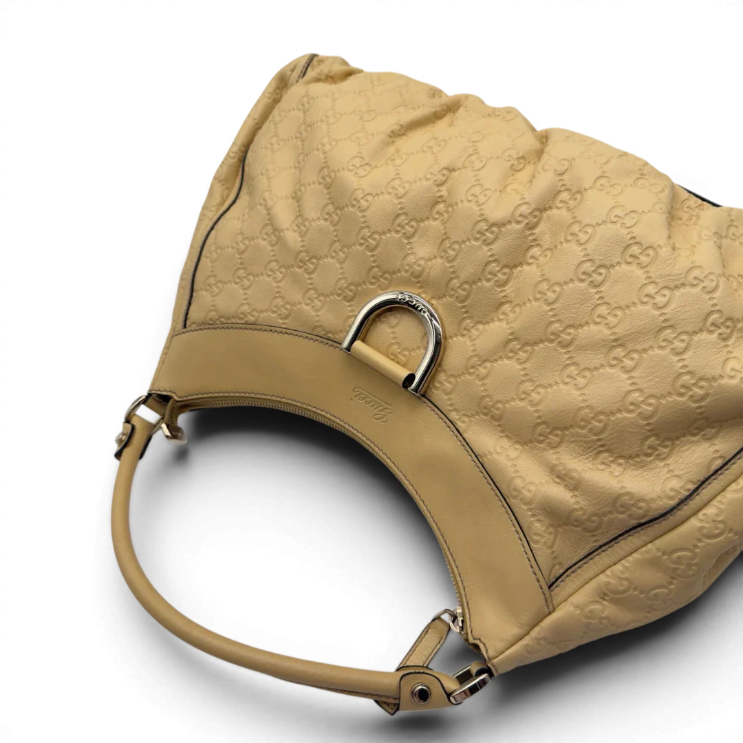 https://cdn.shopify.com/s/files/1/0564/9376/8855/files/Gucci_Schultertasche_D-Ring_large_aus_Leder_monogram_gelb_10.webp?v=1784281400