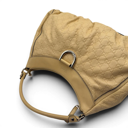 https://cdn.shopify.com/s/files/1/0564/9376/8855/files/Gucci_Schultertasche_D-Ring_large_aus_Leder_monogram_gelb_10.webp?v=1784281400
