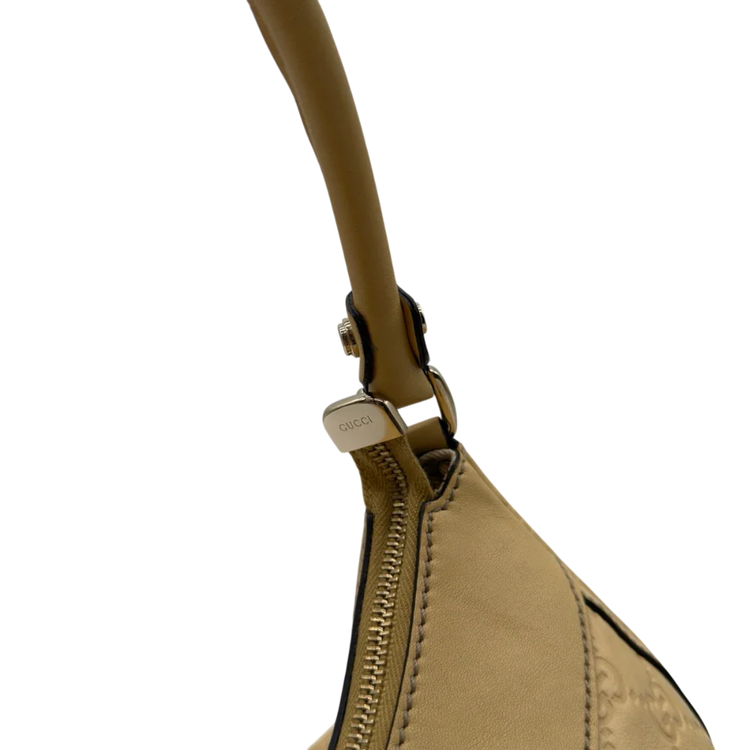 https://cdn.shopify.com/s/files/1/0564/9376/8855/files/Gucci_Schultertasche_D-Ring_large_aus_Leder_monogram_gelb_12.webp?v=1784281399