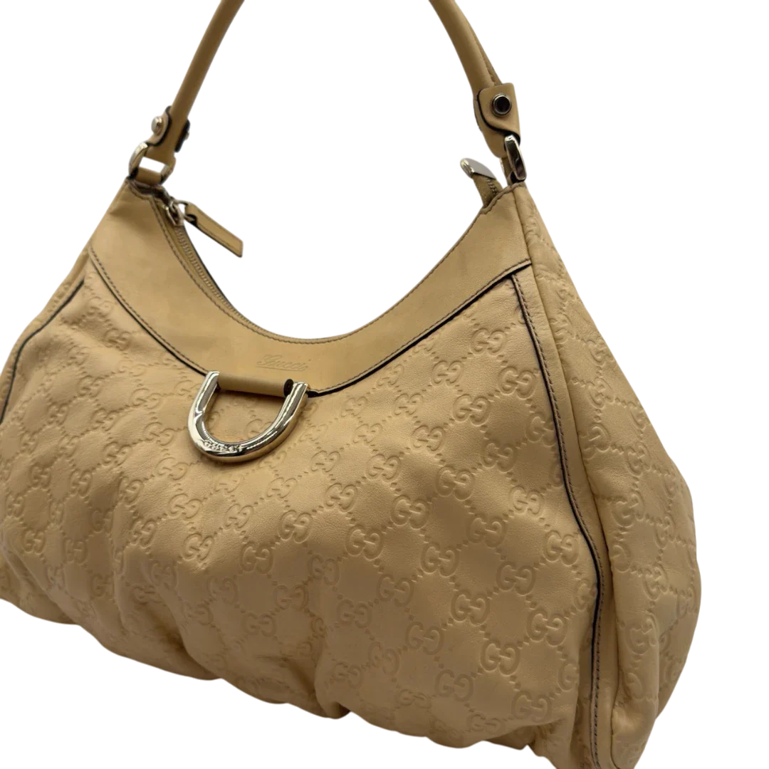 https://cdn.shopify.com/s/files/1/0564/9376/8855/files/Gucci_Schultertasche_D-Ring_large_aus_Leder_monogram_gelb_14.webp?v=1784281400