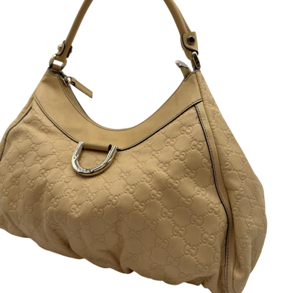 https://cdn.shopify.com/s/files/1/0564/9376/8855/files/Gucci_Schultertasche_D-Ring_large_aus_Leder_monogram_gelb_14.webp?v=1784281400