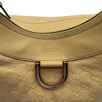 https://cdn.shopify.com/s/files/1/0564/9376/8855/files/Gucci_Schultertasche_D-Ring_large_aus_Leder_monogram_gelb_15.webp?v=1784281400