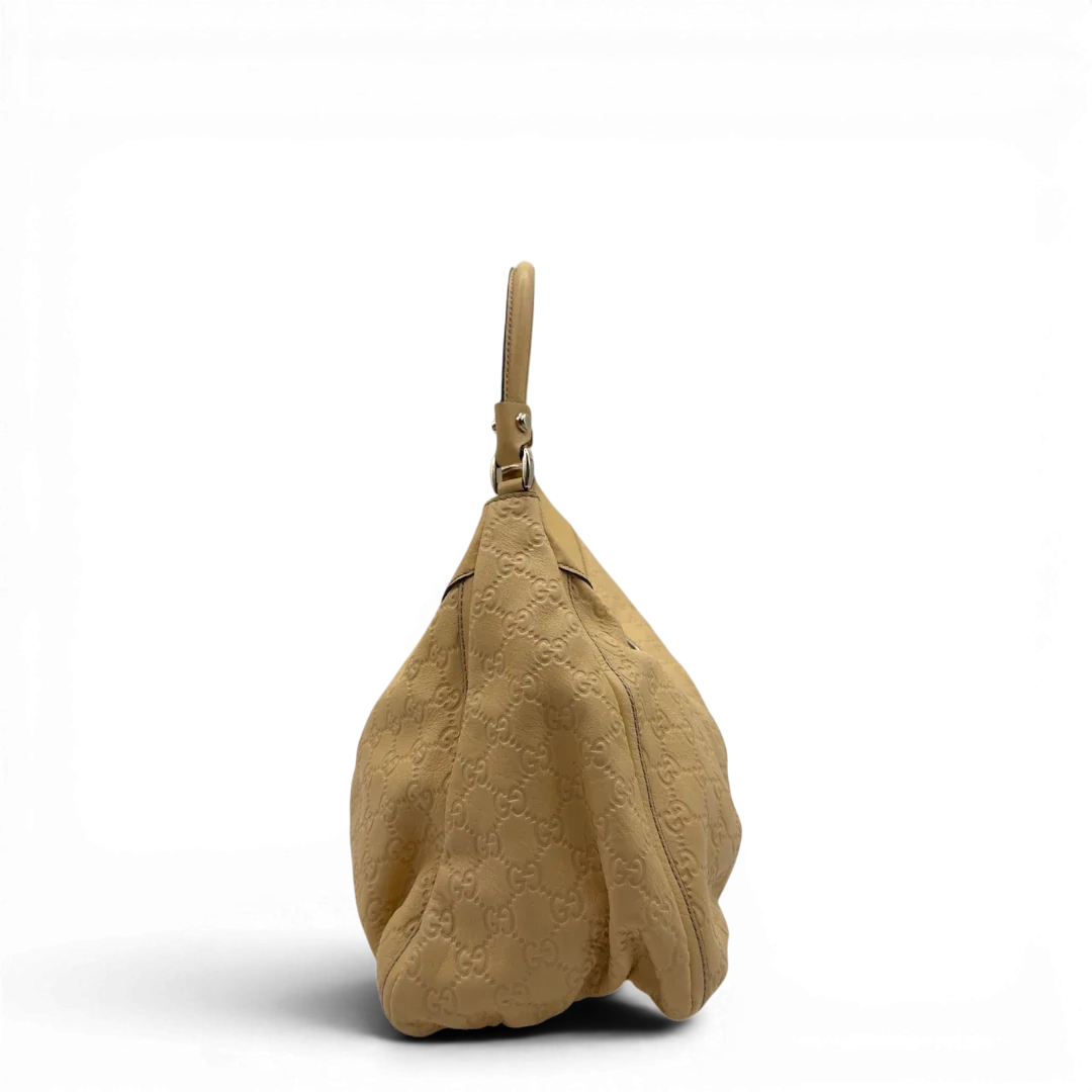 https://cdn.shopify.com/s/files/1/0564/9376/8855/files/Gucci_Schultertasche_D-Ring_large_aus_Leder_monogram_gelb_3.webp?v=1784281400