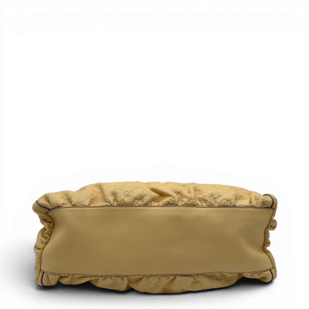 https://cdn.shopify.com/s/files/1/0564/9376/8855/files/Gucci_Schultertasche_D-Ring_large_aus_Leder_monogram_gelb_5.webp?v=1784281399