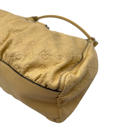 https://cdn.shopify.com/s/files/1/0564/9376/8855/files/Gucci_Schultertasche_D-Ring_large_aus_Leder_monogram_gelb_6.webp?v=1784281400