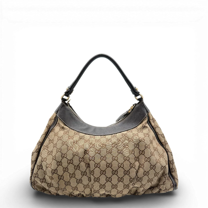 https://cdn.shopify.com/s/files/1/0564/9376/8855/files/Gucci_Schultertasche_D-Ring_large_monogram_beige_vintage_GG_0715.webp?v=1772111450