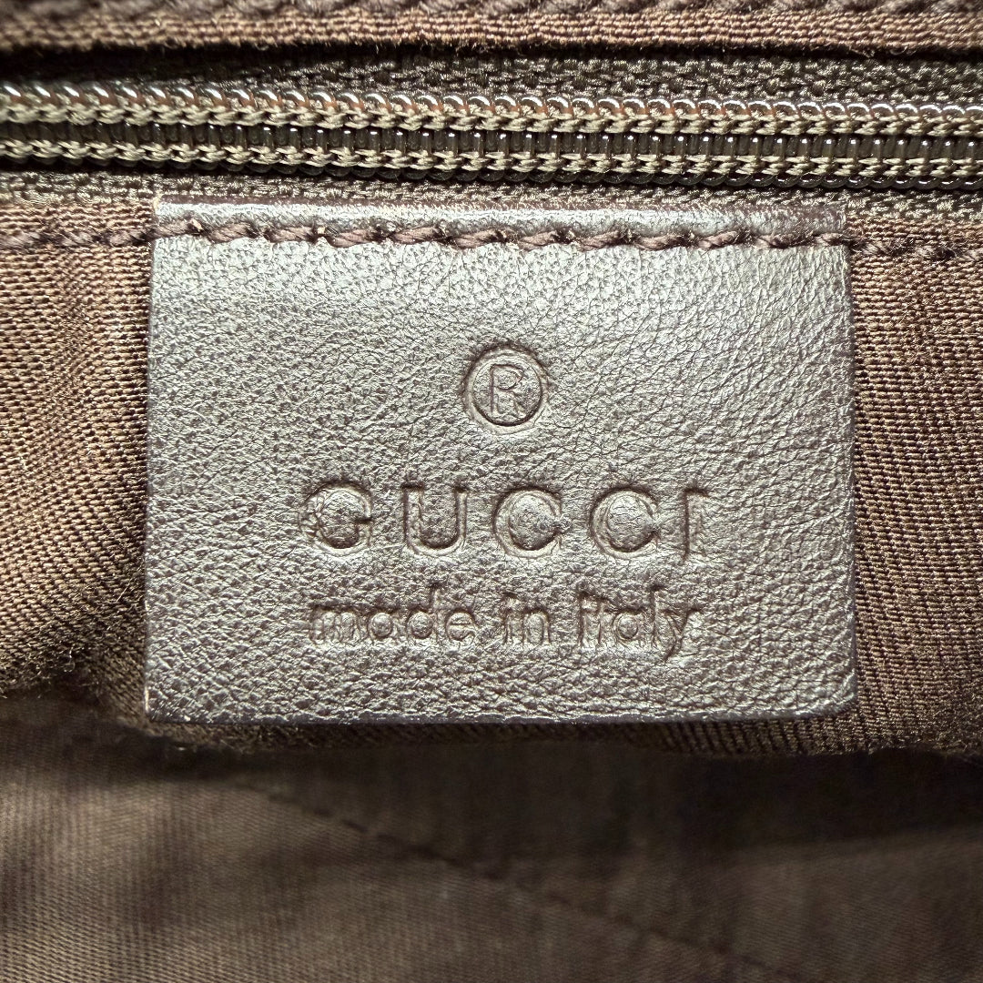 https://cdn.shopify.com/s/files/1/0564/9376/8855/files/Gucci_Schultertasche_D-Ring_large_monogram_beige_vintage_GG_0732.webp?v=1772111450